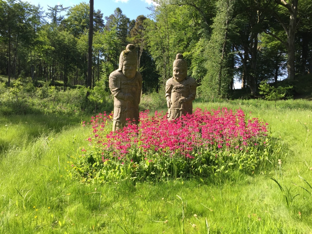 Cowhill Tower - Warrior Guardians by the pond.